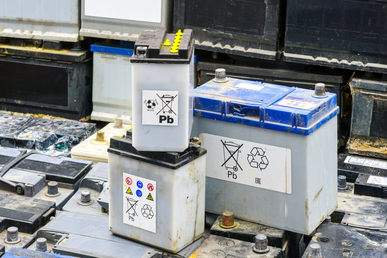 Old batteries with recycling symbols