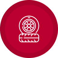 Tire icon on a red circular background.
