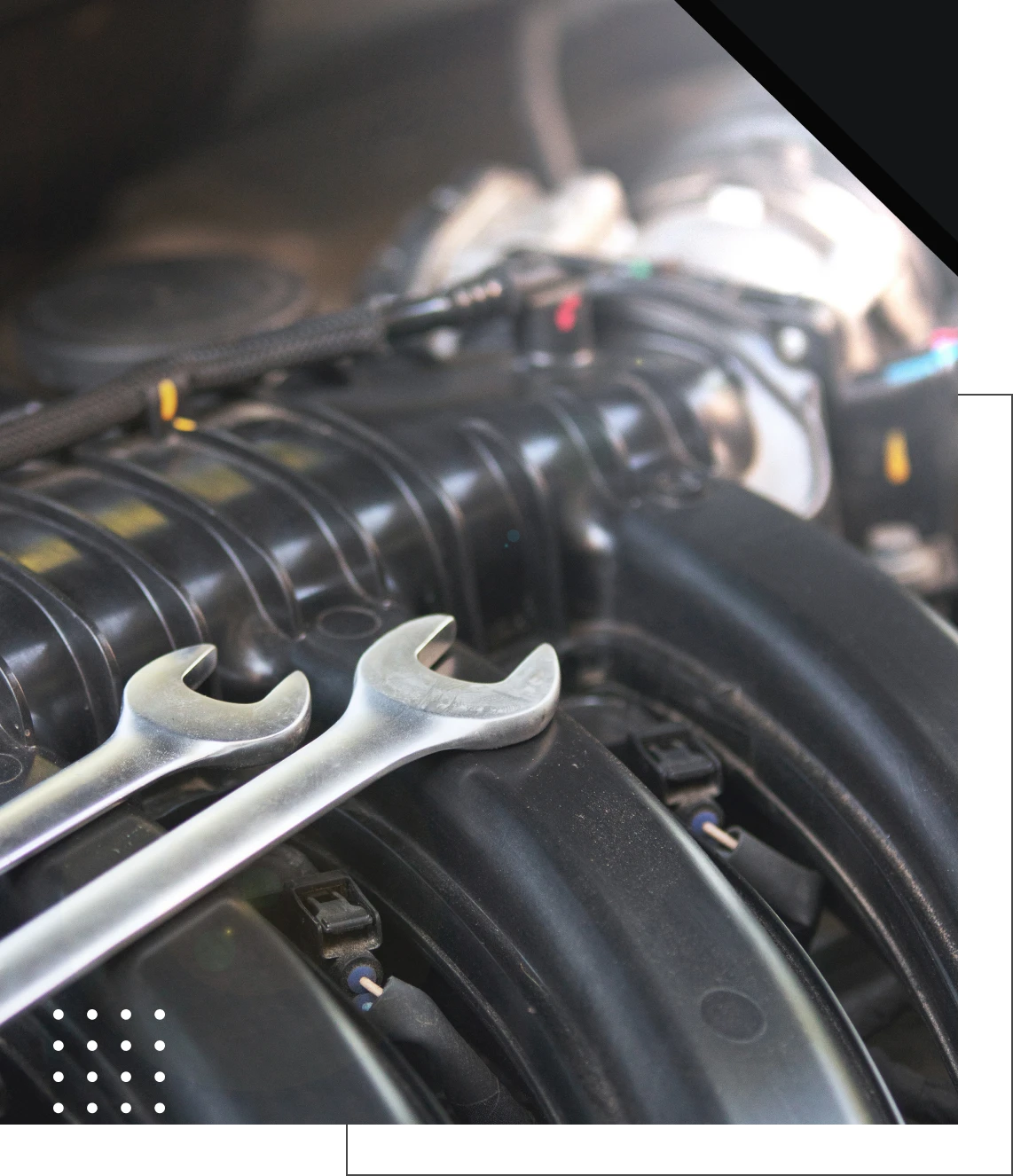 Tools resting on car engine